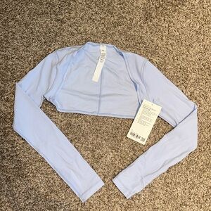 NWT lululemon nulu long sleeve yoga shrug. color: WNDM. size 4.